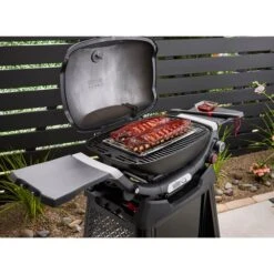 Weber Gasgrill Q 2800N+ Mit Premium-Rollwagen (schwarz, 5,28 KW, Mit Seitentischen) 13 Weber Gasgrill Q 2800N+ Mit Premium-Rollwagen (schwarz, 5,28 KW, Mit Seitentischen) -ALTERNATE Weber Gasgrill Q 2800N mit Premium Rollwagen@@100108666 5